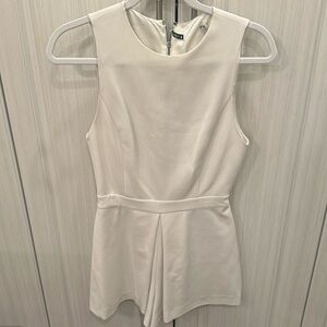 White Alice and Olivia sleeveless romper. Perfect condition.